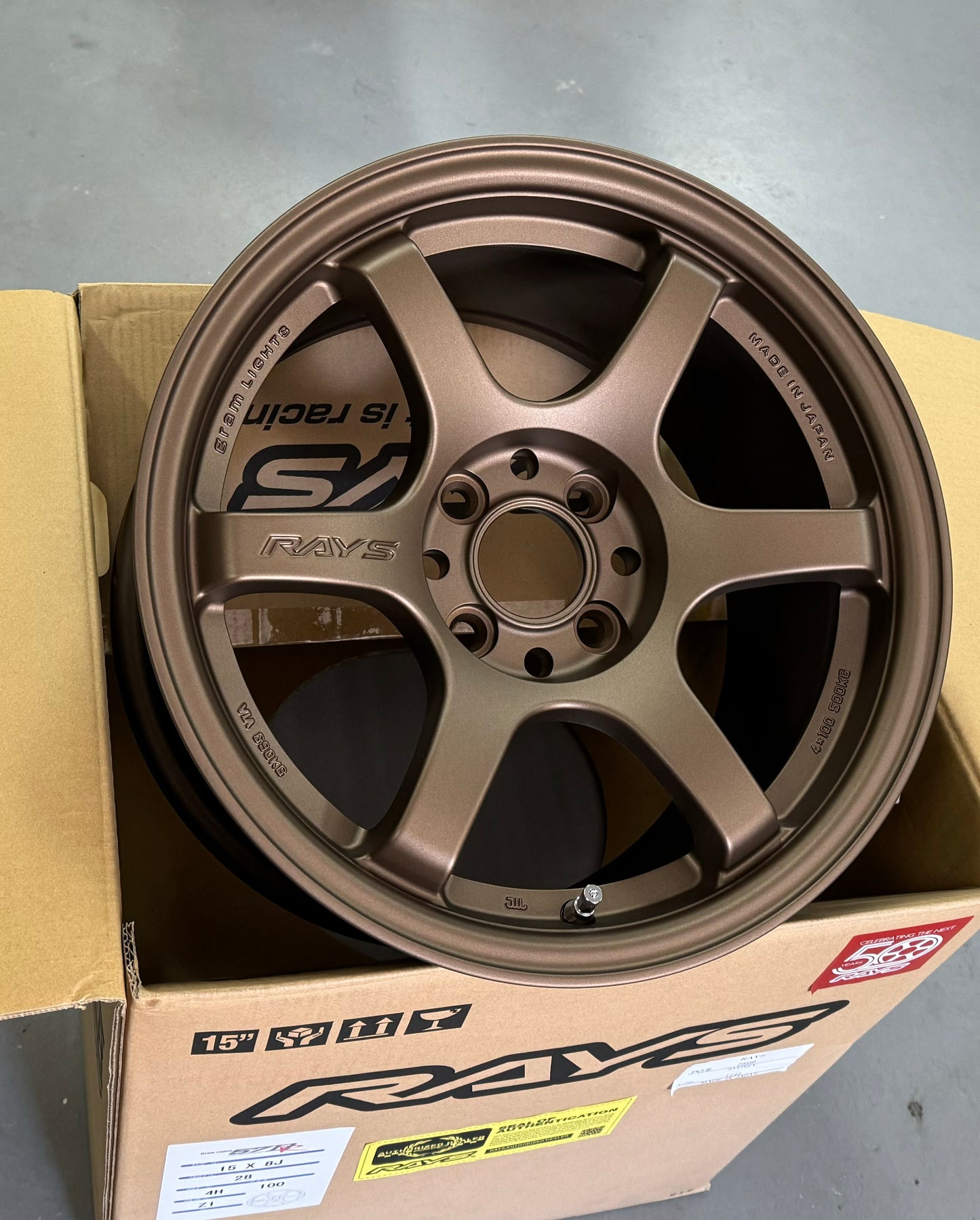 RAYS 57DR BRONZE 15x8 +28 4-100